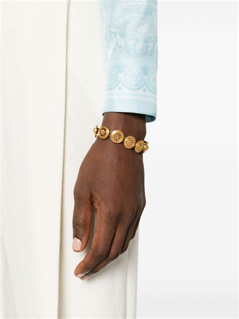 versace bracelet oro tribute|Tribute Medusa chain bracelet in gold .